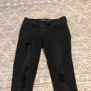 black distressed jeans